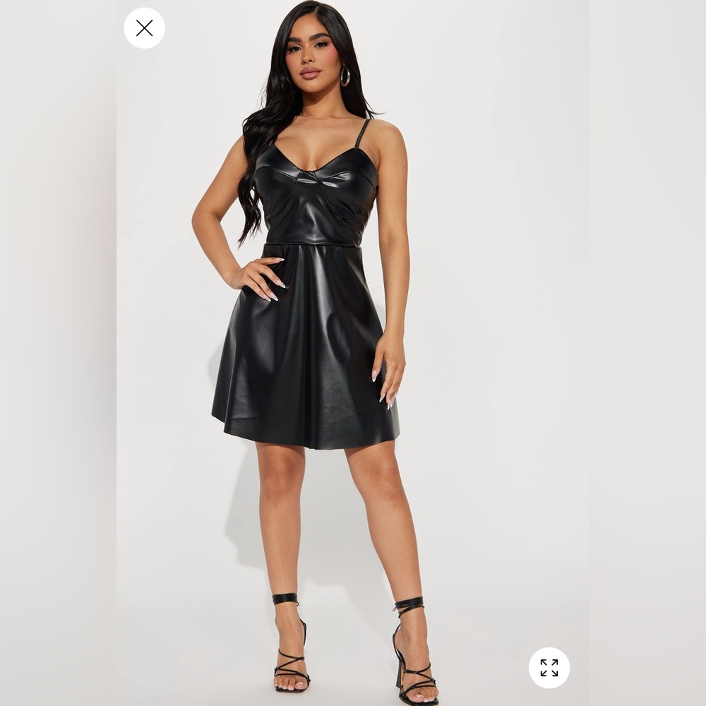 Cute PU leader mini dress. New.